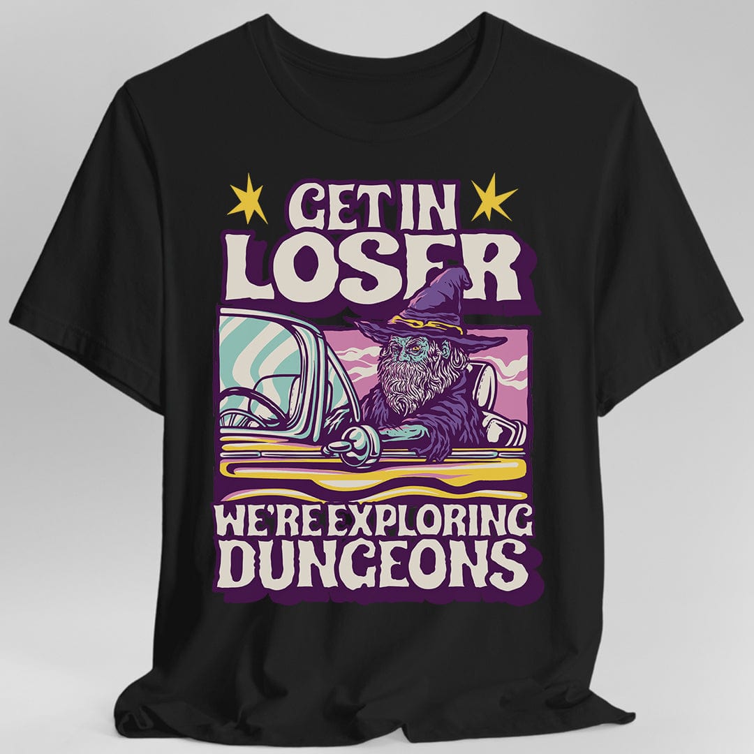 Black t-shirt with a graphic design featuring a wizard in a car and text 'Get in loser, we're exploring dungeons'