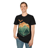 Black t-shirt with a geometric dice landscape design featuring a dragon, mountains, and a castle, worn by a man