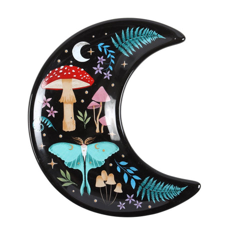 Decorative moon-shaped trinket dish with mushrooms and a luna moth on a black background
