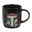 Black mug with mushroom design on a white background