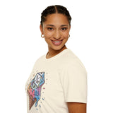 Person wearing a cream t-shirt with a colorful ice cream cone and die design on a white background