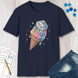 Navy blue t-shirt with ice cream cone and dice design on a wooden surface with jeans and dice.