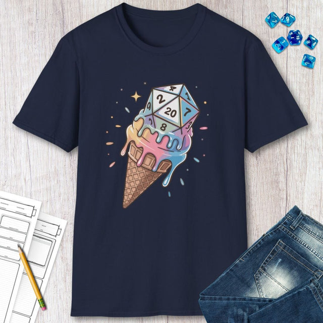 Navy blue t-shirt with ice cream cone and dice design on a wooden surface with jeans and dice.
