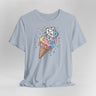 Light blue t-shirt with ice cream cone and dice design on a gray background