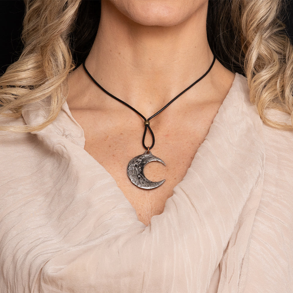 Pewter necklace - pendant is a crecsent moon, shown worn