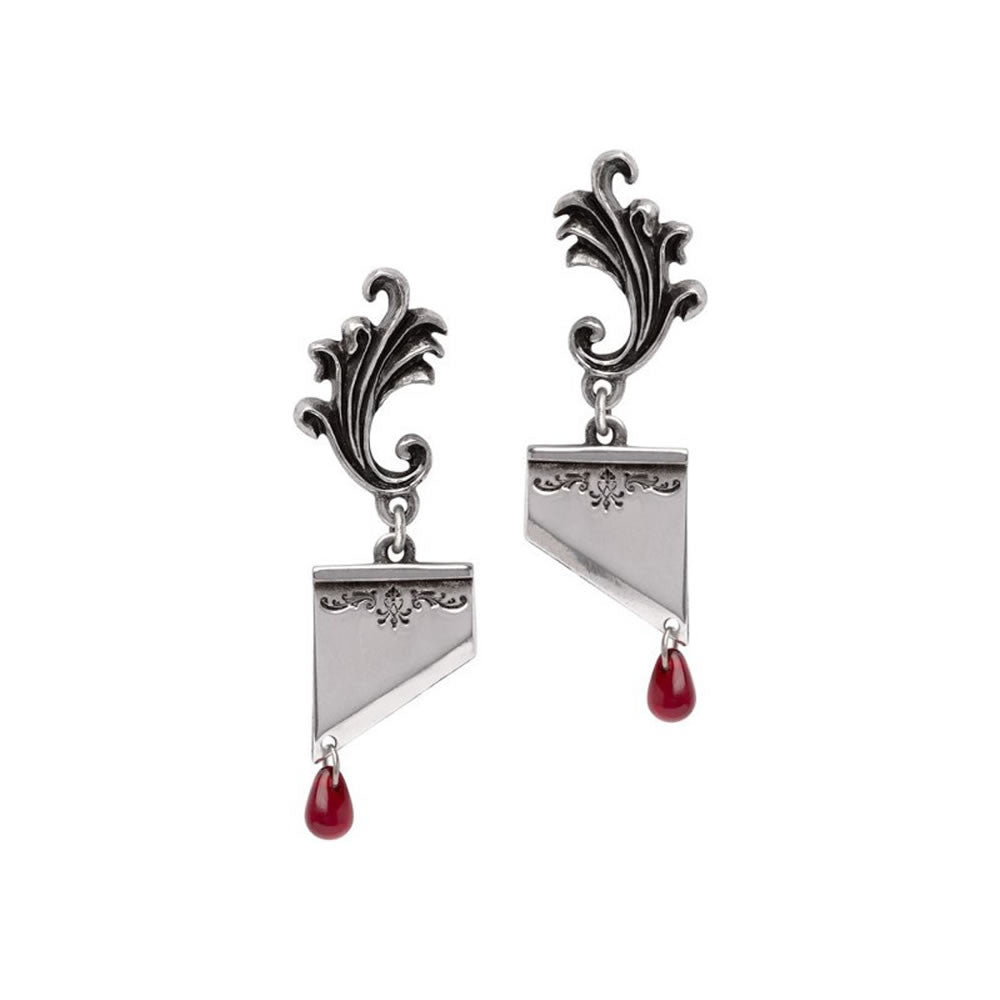 Pair of earrings shaped like guillotines with crystal blood droplets