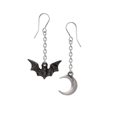 Pair of bat and moon earrings on a white background