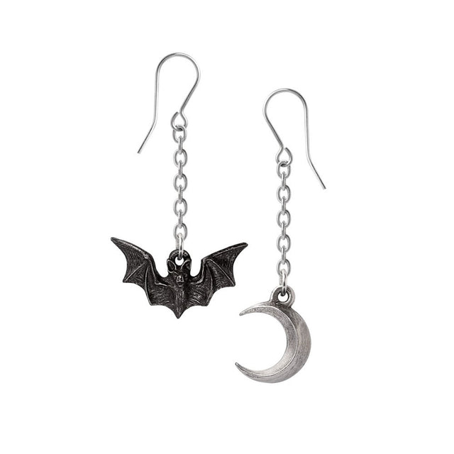 Pair of bat and moon earrings on a white background