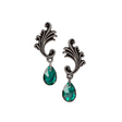 Pair of earrings with decorative metalwork and green crystals on a white background