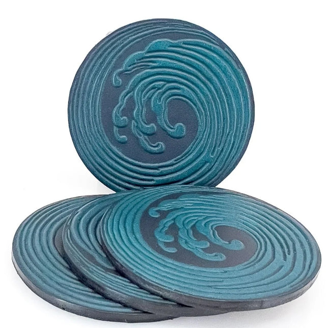 Leather coasters with wave design in blue