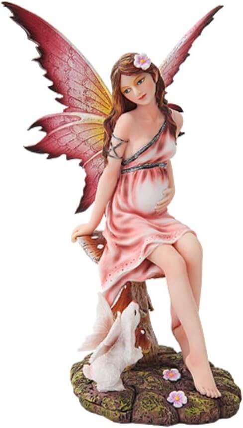 Pregnant fairy in pink sitting on a mushroom with a white winged rabbit