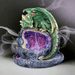 Green dragon incense burner in a smoky setting