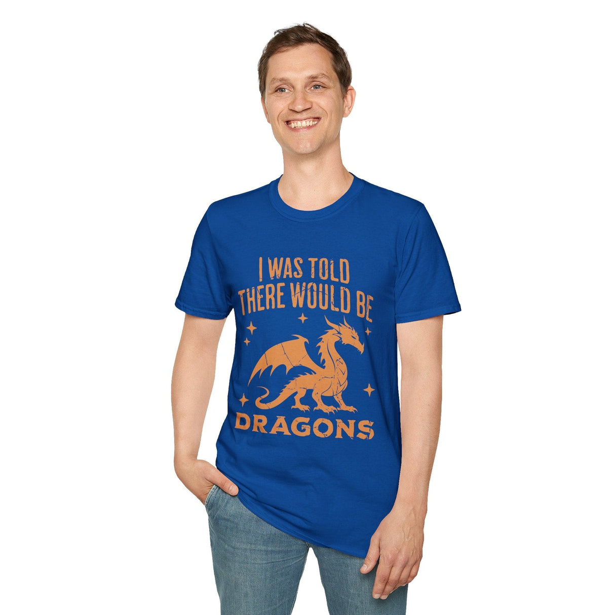 Person wearing bright blue t-shirt with orange dragon graphic and text reading "I was told there would be dragons"