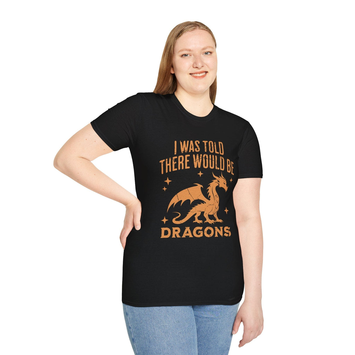 Woman wearing black t-shirt with orange dragon graphic and text reading "I was told there would be dragons"