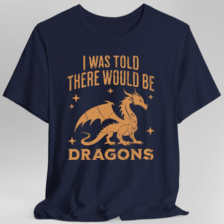 Blue t-shirt with orange dragon graphic and text reading "I was told there would be dragons"