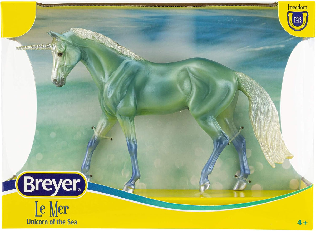 Model unicorn in shades of blue and white with silver, shown boxed - Le Mer