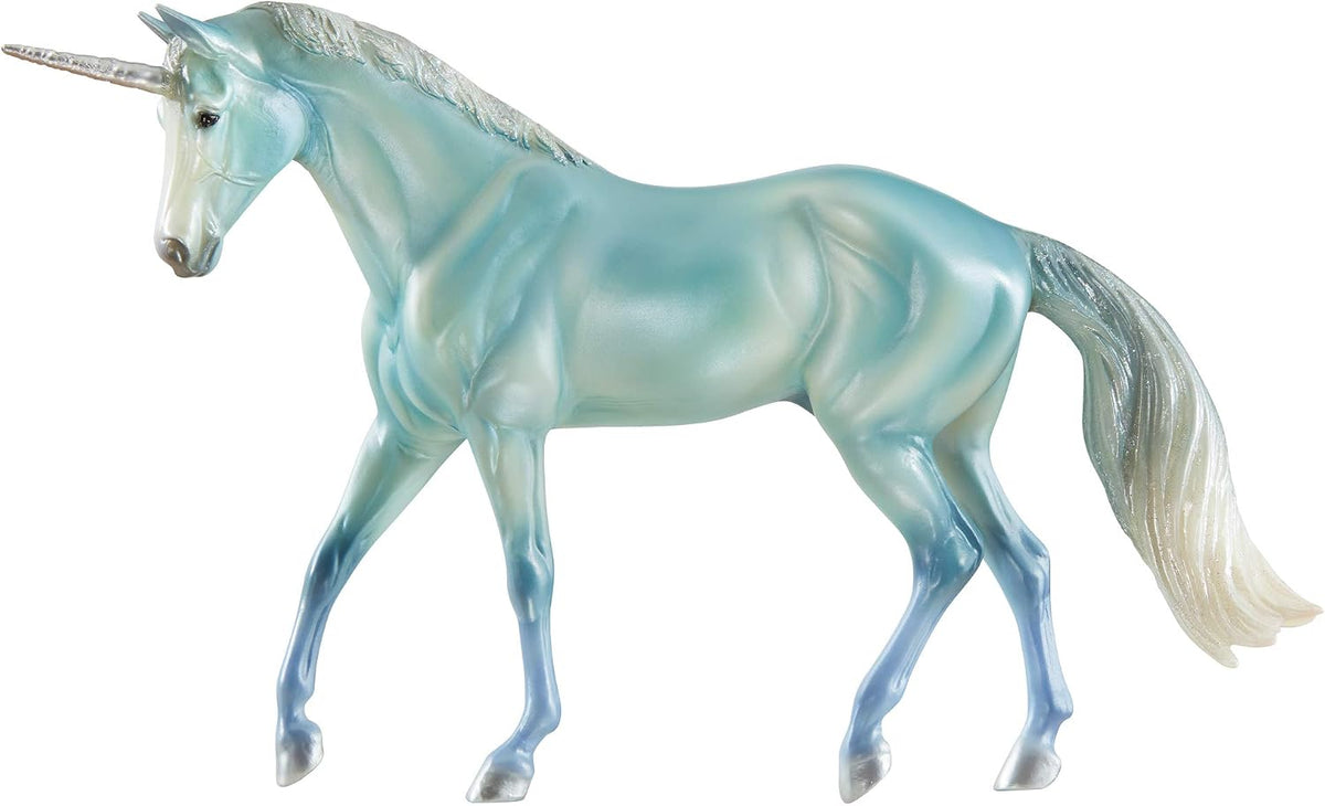 Model unicorn in shades of blue and white with silver