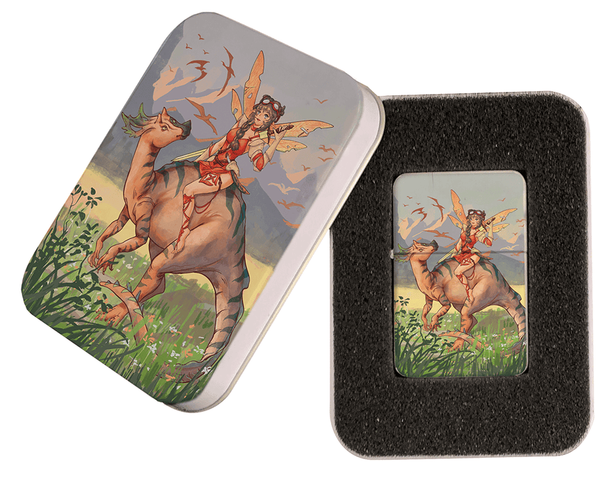 Brass lighter with matching gift tin, showing a fairy with a sword riding a dinosaur in a prehistoric world.