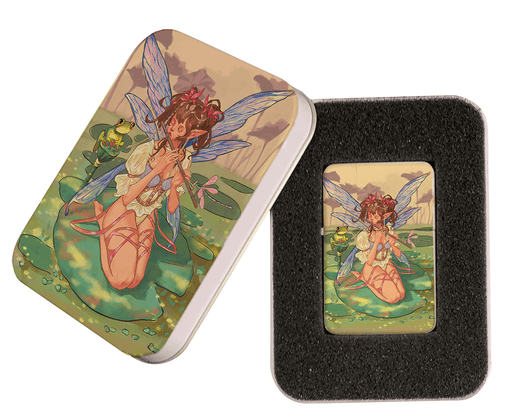 Brass lighter with matching gift tin, showing a fairy playing the flute on a lilypad in a pond with a frog