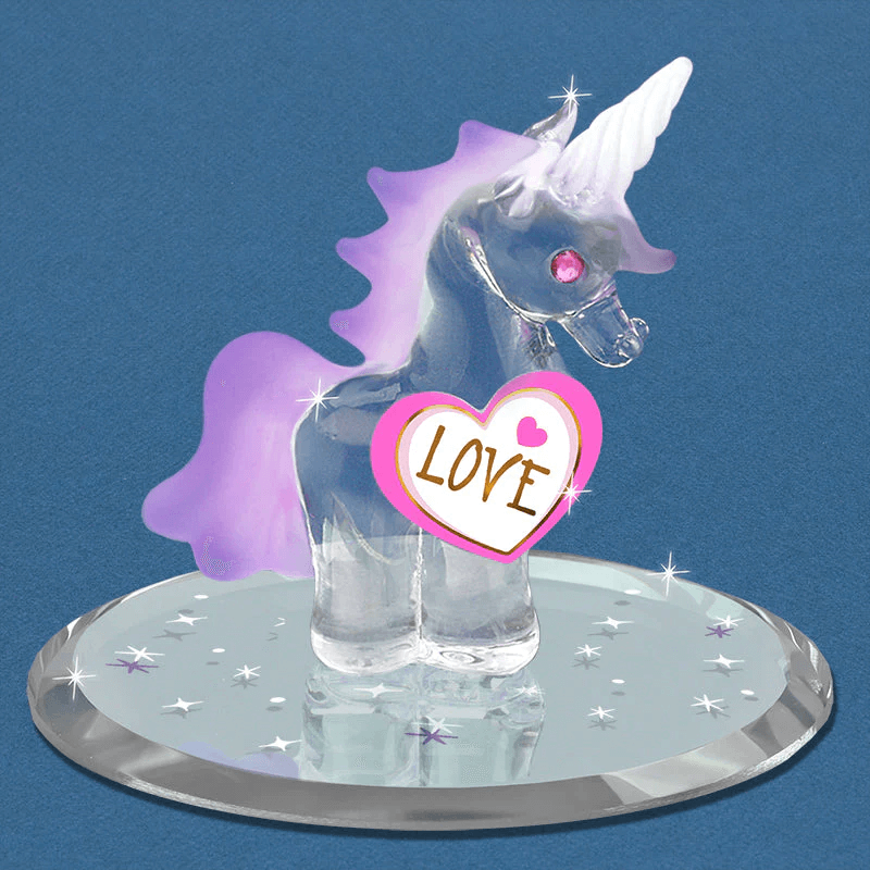 Glass unicorn figurine with purple frosted mane & tail and horn and pink crystal eyes, heart that reads "LOVE" on a mirrored base with star designs