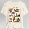 Off white t-shirt with colorful illustrations of medieval bestiary animals