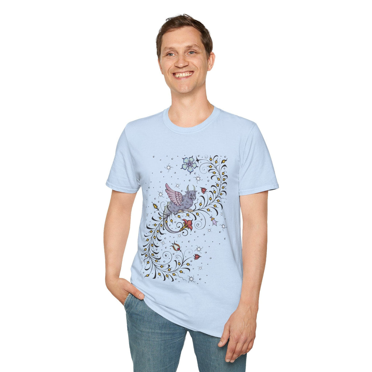 Person wearing light blue t-shirt with a medieval manuscript dragon and floral design