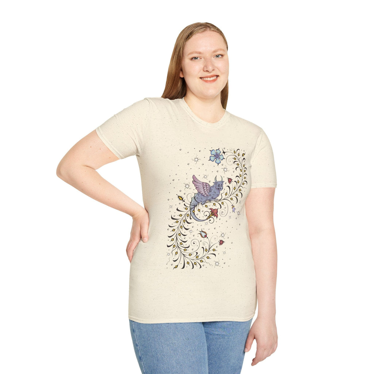 Lady wearing cream t-shirt with a medieval manuscript dragon and floral design