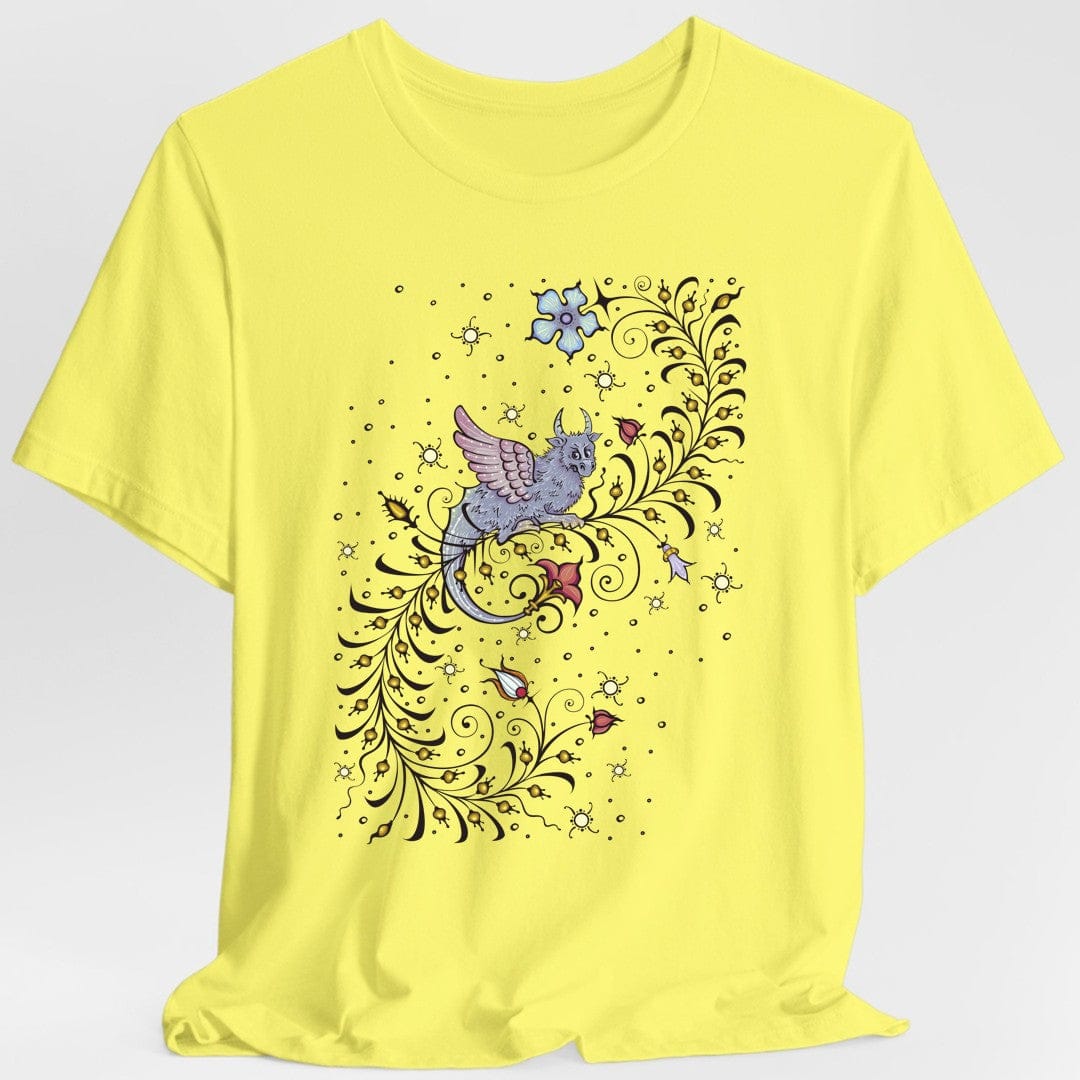 Yellow t-shirt with a medieval manuscript dragon and floral design