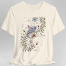 White t-shirt with a medieval manuscript dragon and floral design
