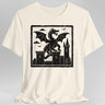 Off white t-shirt with a black dragon and castle graphic on a gray background