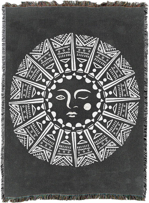 Tapestry blanket, art by Melissa Wang, stylized tribal moon in white on black background