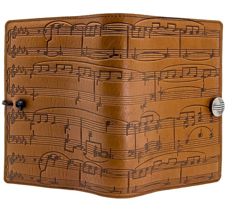 Saddle tan leather notebook with sheet music design