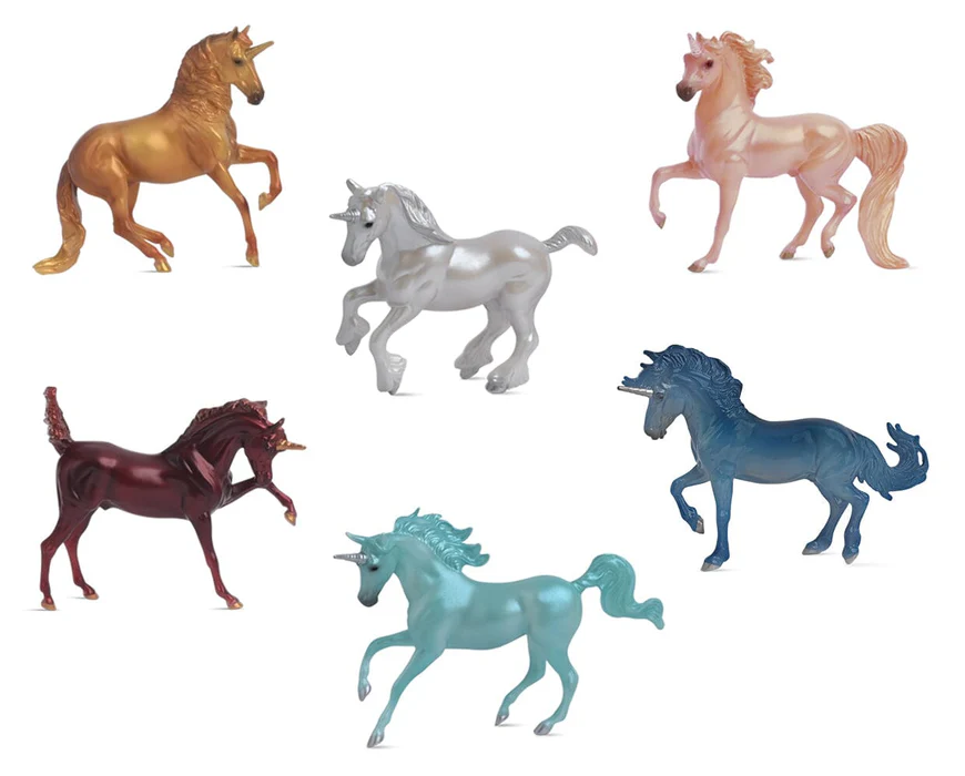Six potential unicorns in the blind bag, in a variety of colors and poses.