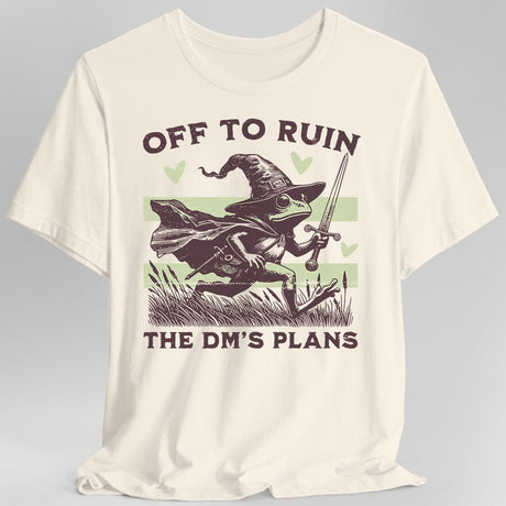 Cream T-shirt with a graphic of a frog in a wizard hat holding a sword, text 'Off to ruin the DM's plans'