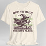 Cream T-shirt with a graphic of a frog in a wizard hat holding a sword, text 'Off to ruin the DM's plans'