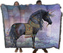 Osirus unicorn tapestry blanket held up by two adults to show large size