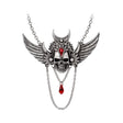 Gothic-style necklace with skull and wings design on a white background