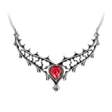 Necklace with a heart-shaped red gem and intricate pewter design on a white background