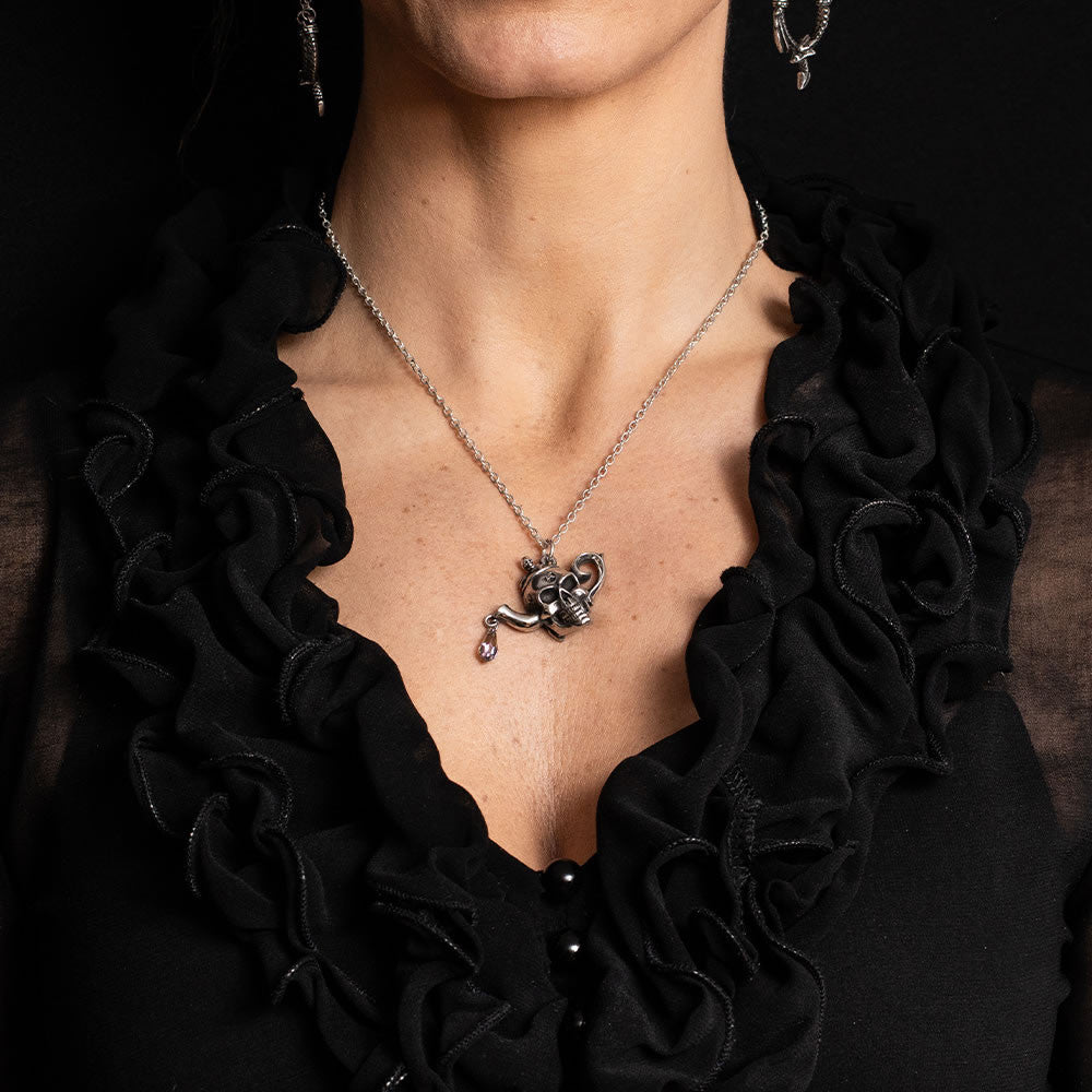 Pewter skull teapot with crystal drip pendant necklace, shown worn