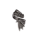 Silver dragon head and wing ring on a white background