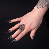Pewter ring with a serpent and Thor's hammer, shown worn