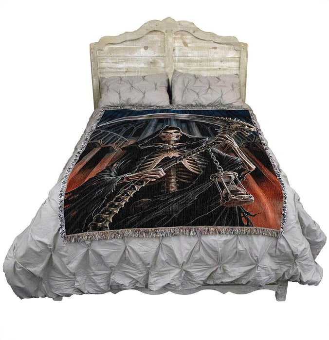 Grim Reaper tapestry shown on a bed