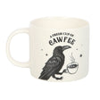 Mug with a crow holding a coffee cup and text 'A Fresh Cup of Cawfee' on a white background