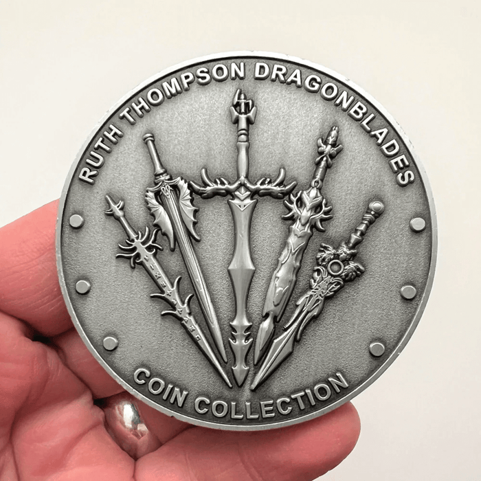 Back of Seablade coin, Ruth Thompson Dragonblades Coin Collection with swords