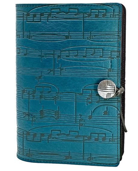 Blue leather notebook with sheet music design