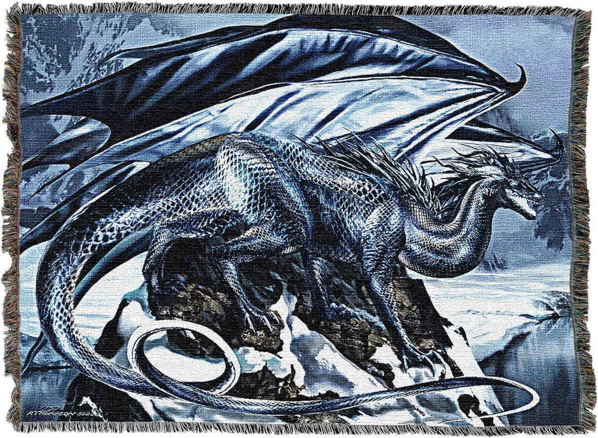 Woven blanket with a dragon design on a blue and gray winter mountain background