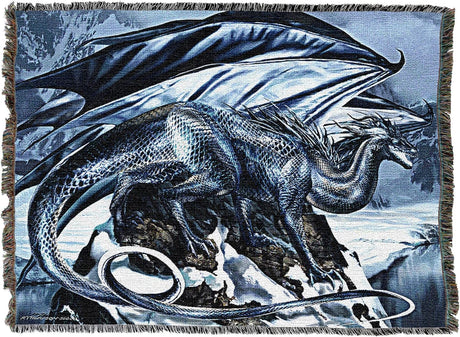 Woven blanket with a dragon design on a blue and gray winter mountain background