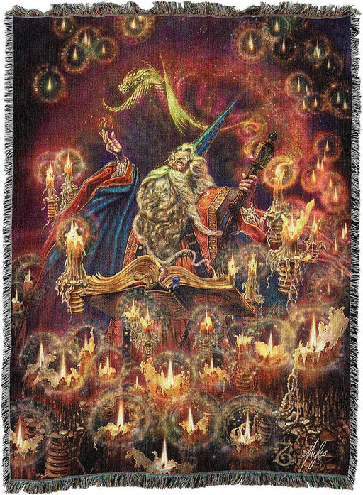 Tapestry blanket, art by Myles Pinkney, wizard surrounded by lit candles casting a spell, ancient tome in front of him and dragon above