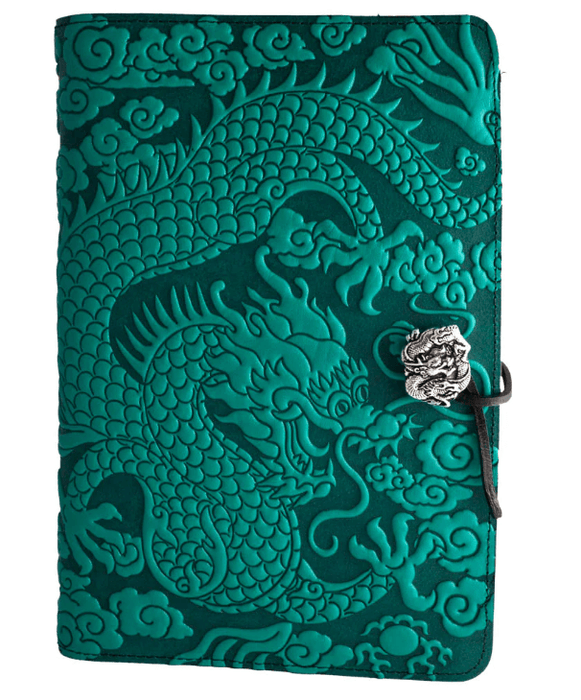 Leather journal with all over dragon design, shown in teal
