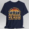 Navy blue t-shirt with vintage-style rainbow & adventurers graphic and text reading "The real treasure was the friends we made along the way"